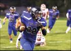 Carter Holman took the ball upfield for the Thunder against KMS.