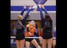 Madison Cebulla watches as her kill attempt goes past the Thunder defense.