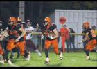 Ryan Supper took the ball upfield for the Tigers against Benson.