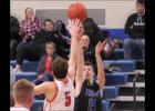 Travis Warner sent up a jump shot for the Thunder against Osakis.