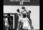 Bryce Westrich blocked a layup attempt from Brandon-Evansville.