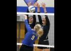 Thunder seniors Sahra Gugglberger (L) and Emma Liebsch (R) went up for a block against Swanville senior Hannah Schneider (9).