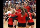 The Cardinals celebrated after rallying for a 15-11 win in the fifth set of last Thursday’s match.