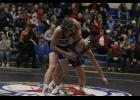 Caleb Pesta went for a takedown in his match at 160 against Albany.